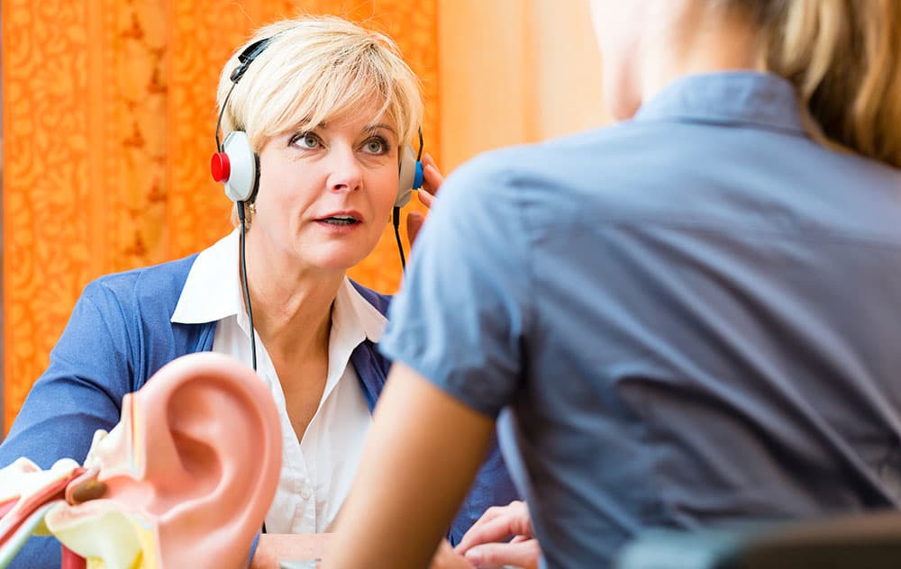 Woman with hearing test